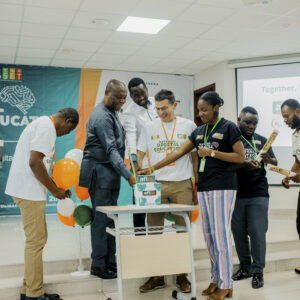 Cake cutting for the launch of the digital education platform for school leaders in Ghana