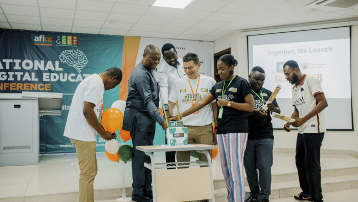 Cake cutting for the launch of the digital education platform for school leaders in Ghana