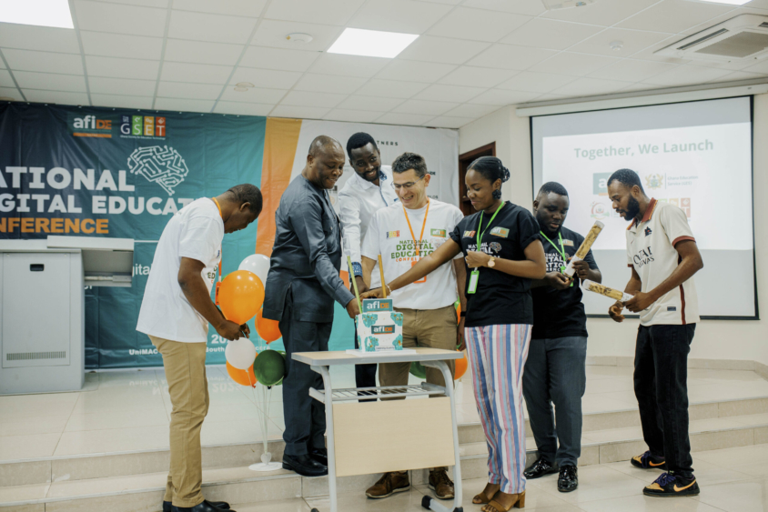Cake cutting for the launch of the digital education platform for school leaders in Ghana